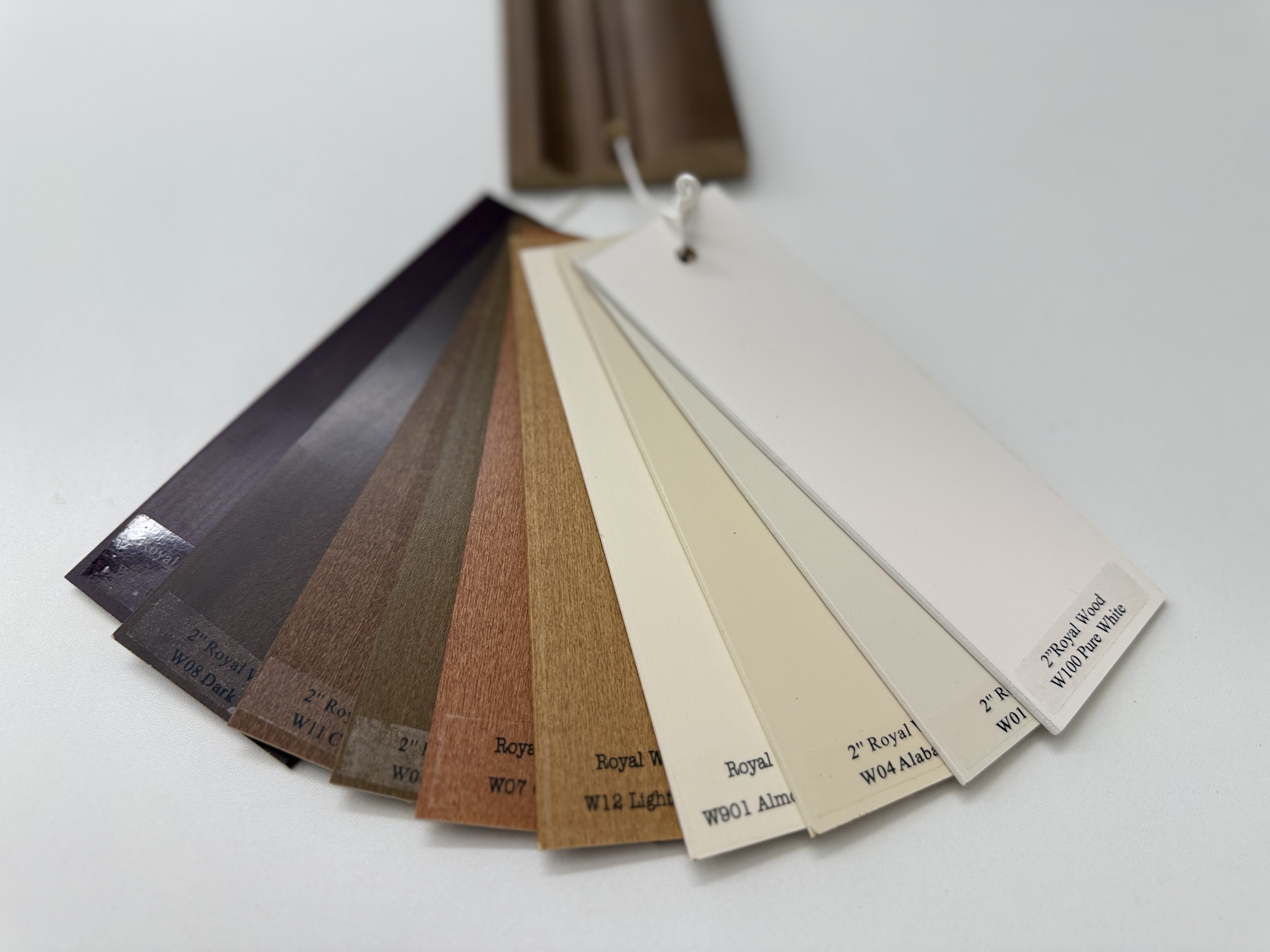 Overhead photo of all real wood blind swatch colors (main product photo)